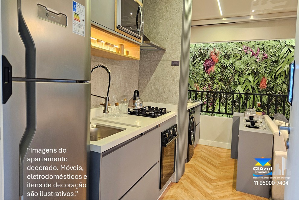 Apartamento decorado do PIM Vila Sônia com cozinha planejada integrada à sala